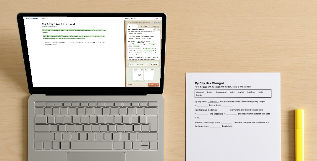 A laptop with the extension open beside a highlighted article, and the printed gap-fill sheet next to it